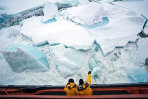 Big-Ice Photo of sea ice with people on ship